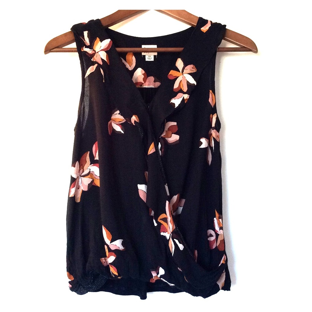 A New Day black floral sleeveless blouse.